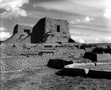 Black and white photograph of two ancient chapels titled "Sisters," Pecos Mission, New Mexico, architectural and landscape photography by Tony Sanders